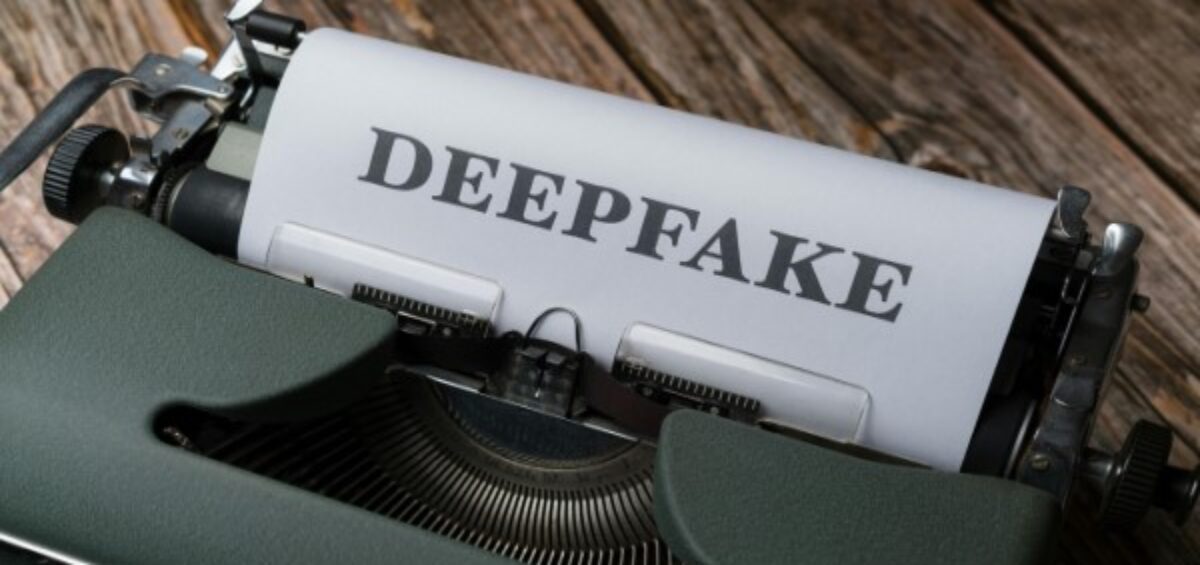 A typewriter with the word deepfakes on it